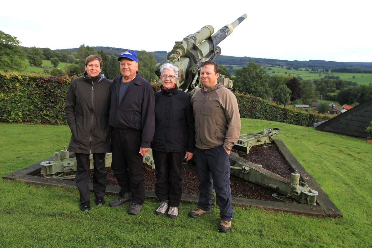 Eric with his parents and sister at a Battle of the Bulge site overlooking the countryside