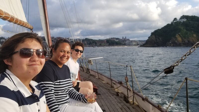 Eric's wife, son, and daughter sailing in San Sebastián