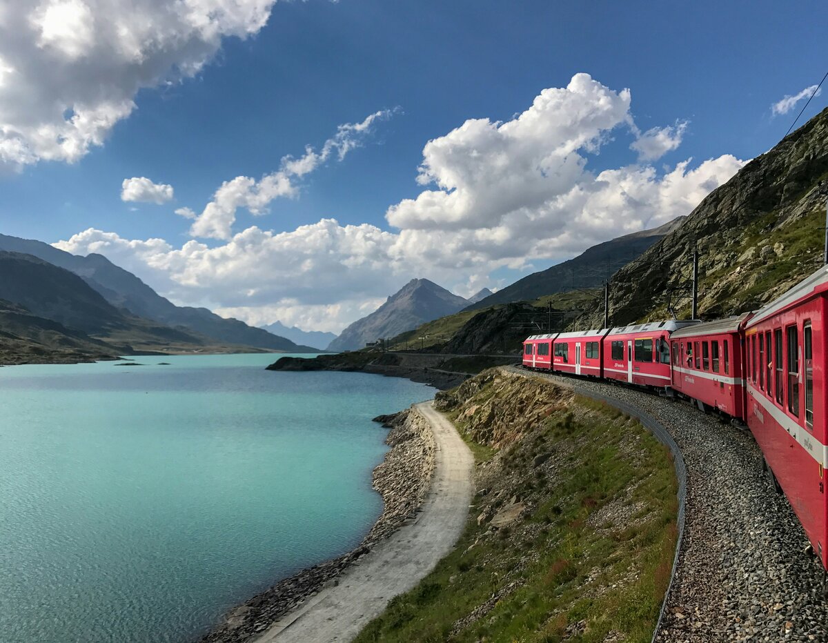 Glacier Express panoramic train crossing an alpine viaduct