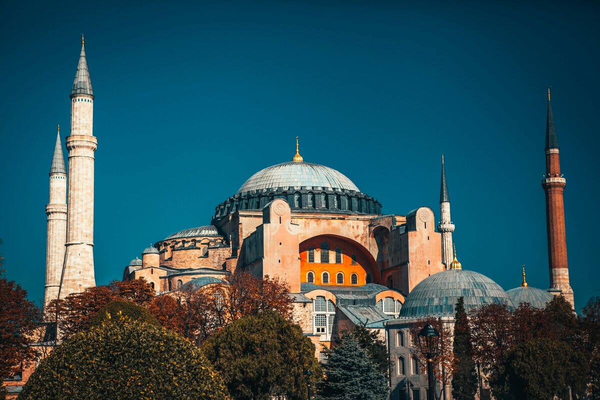 Hagia Sophia and Blue Mosque at dusk over Istanbul skyline