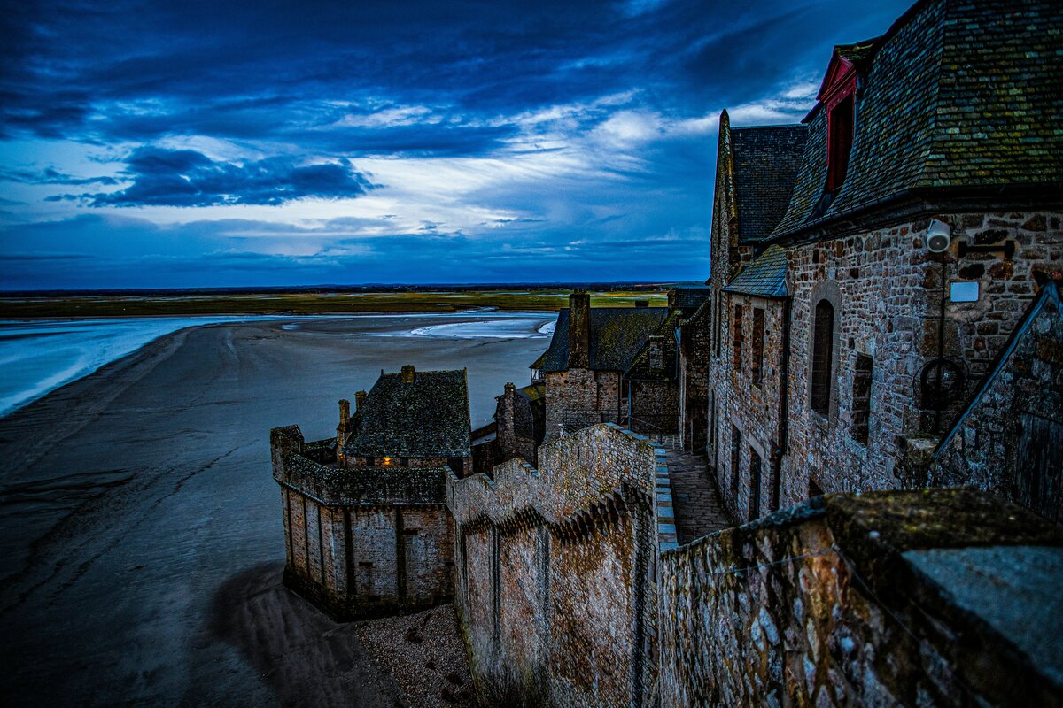Mont-Saint-Michel rising from the tides at dusk